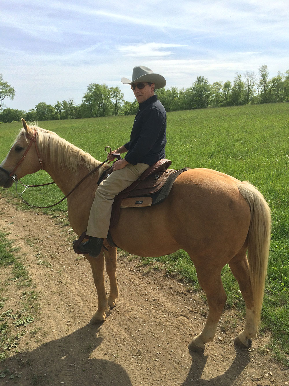 Paul Monte on horseback at Deep Hollow Ranch