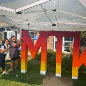 Angela Filangeri painting MTK sign