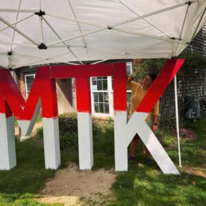 Angela Filangeri painting MTK sign